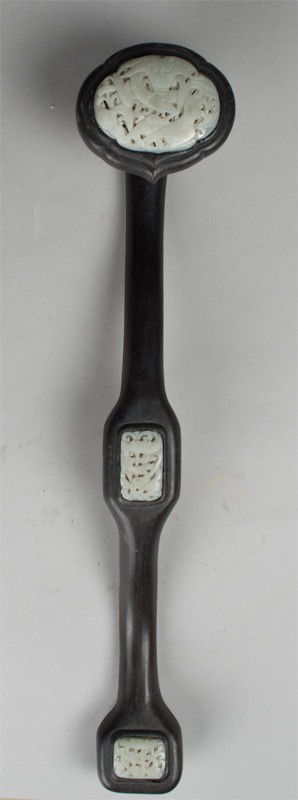 Chinese Carved Hardwood & Jade Scepter: The hardwood ruyi scepter inlaid with three carved jade plaques depicting dragons and clouds, 19.5"L, private collection Grosse Pointe Shores, MI.