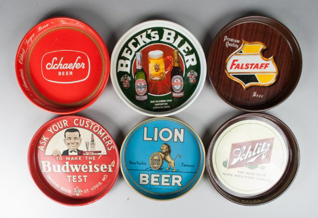 (6) Vintage Beer Advertising Trays: Includes Lion Beer, Schlitz, Budweiser Test, Falstaff, Schaefer Beer, and Beck's Beer. All in good condition with wear consistent with age and use.