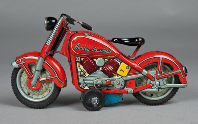 Japanese Friction Tin Litho Harley Davidson: A nice condition harley, marked T.N. within a diamond, good graphics, small loss to paint decoration, 9"L, circa 1960's