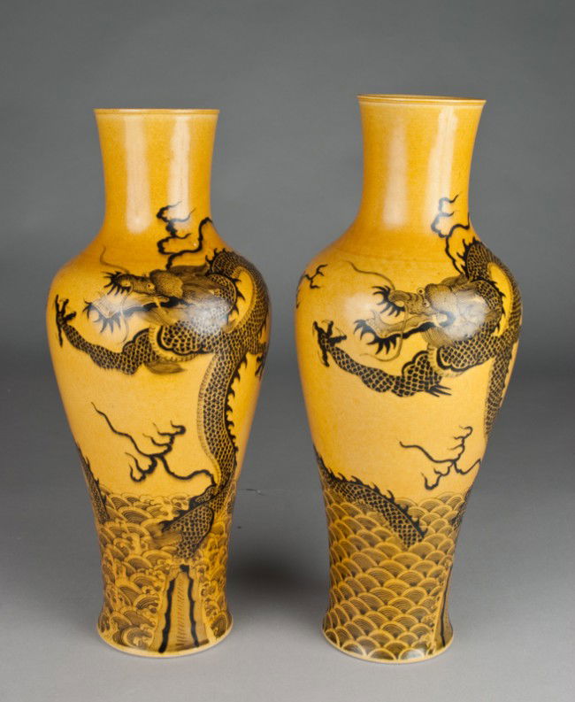 Pr. Large Chinese Yellow & Black Porcelain Vases: Of baluster shape, finely painted to depict black dragons amongst ruyi clouds, each bottom with six character mark in underglaze black, each 16.25"H.