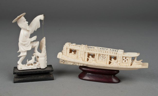 (2) Pieces Chinese Carved Ivory: Finley carved to depict a fisherman and dog holding his catch, and a river boat with two sails and people, 5"long and 4" high, circa early 20th century.