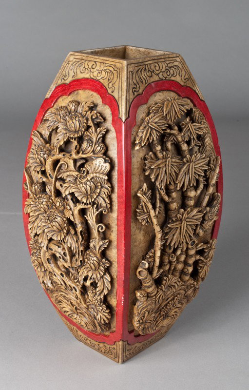 A Large and Impressive Soapstone Vase: Finely carved with raised decoration on all four panels bordered by a red cartouche shaped panel, 12"H and expertly done circa 20th century.