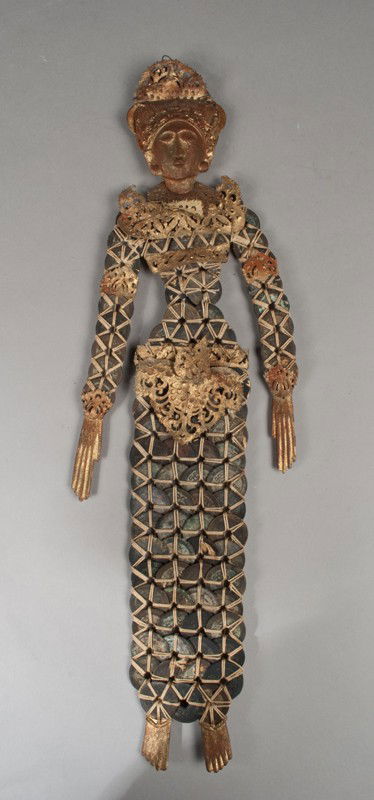 Chinese Wedding Doll Of Stitched Coins & Wood: With carved wood face and hands, the body of stitched coins, the waist and neck with gilt trim, 18"L, circa 1900, very well done.