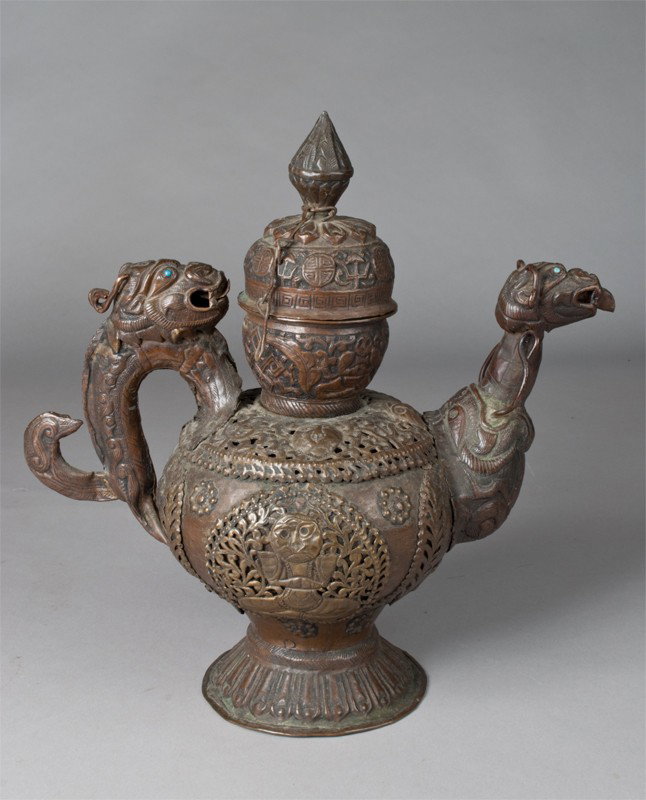 Chinese or Tibetan Copper Tea Pot 19th Century: Finley cast with mythical beast handle and spout, with inlaid turquoise, 14"H, some dents in body, lacking some stones.