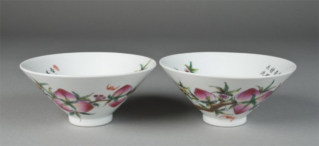 Pr. Of Chinese Famille Rose Footed Bowls: The footed bowls, finely painted on interior with peach blossom, calligraphy poem and seal in iron red. Exterior with longer peach blossom and two bats in iron red. Six character mark within two conce