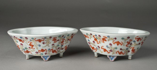 Pr. Of Chinese Famille Rose Planters: Footed planters cartouche form, finely enameled with flying bats amid ruyi in varying colors, resting on four enameled feet. Six character mark in iron red on underside for Great Qing Qianlong Product
