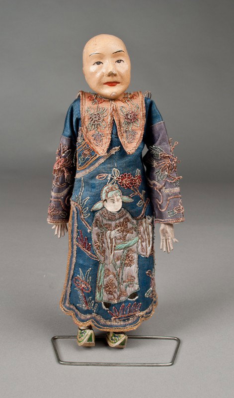 Chinese Composition Doll: With hand painted details, hand sewn robe with figures, displayed on metal stand, 10"H, circa 1900
