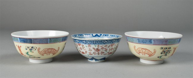 (3) Chinese Porcelain Bowls: To include a pair of bowls painted to depict Greek key design, bats, symbols and floral; each with six character mark in iron red on underside. Together with a tea bowl in blue, iron red and green dep