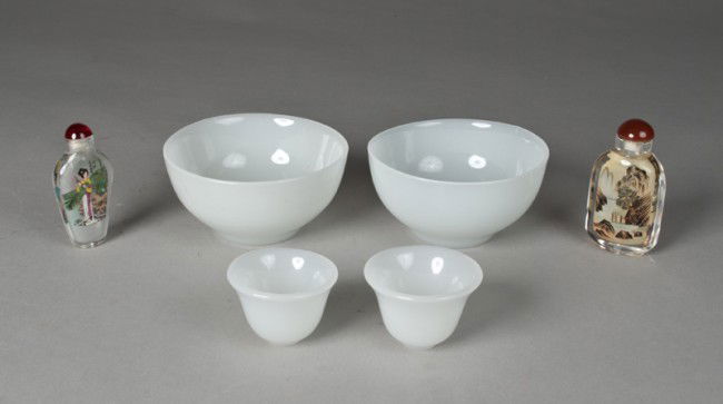 (6) Chinese Glass Articles: Includes two white glass bowls, two white glass tea cups, and two reverse painted snuff bottles, one with figure and other with landscape. Largest 2 & 1/8" H x4 & 5/8" Dia. 20th century.