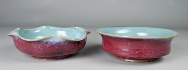 Pr. Chinese Strawberry Glazed Porcelain Bowls: One with scalloped rim, and brown glazed foot rim, one with open rim, and brown glazed foot rim, one 10.75"D x 3.75"H, and one 10.75"D x 3.5"H, circa 19th - 20th century.