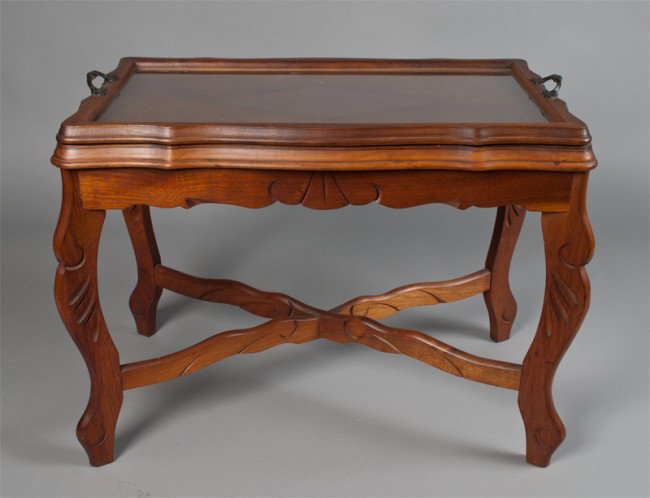 A Mahogany Inlaid Serving Table: With carved legs and stretchers, the top inlaid with a diamond design, with movable glass and wood tray with shaped handles, 18"H x 23"W x 15"D, circa 1940's.