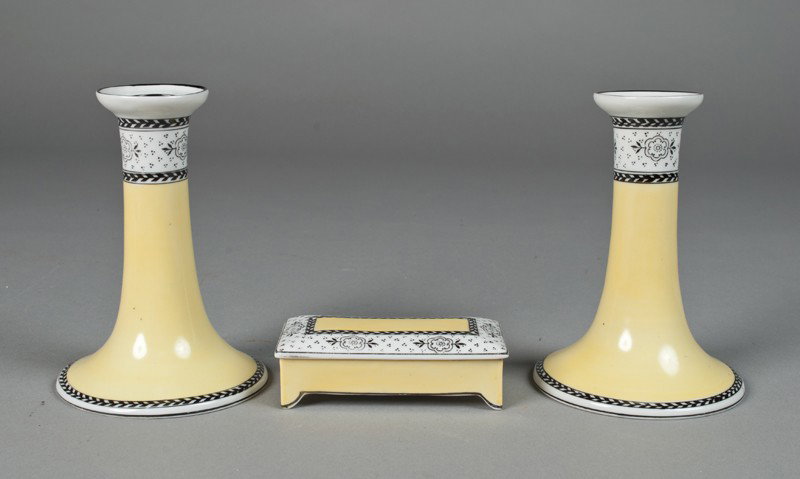 (3) Piece Nippon Porcelain: Includes a pair of candlesticks, and small covered box in yellow with black floral and fletching. Each piece green wreath mark. Tallest 5.25" H, excellent condition.