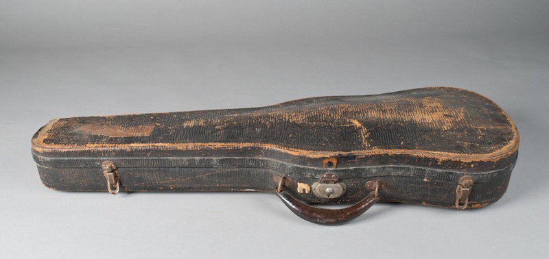 Antique Nicolaus Amati Copy Cased Violin: Parts included and with bo, in black case with green interior. Needs to be restrung and re-glued. 23" L.