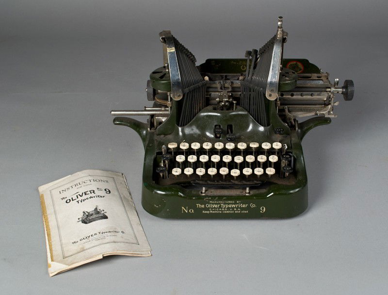 Antique Oliver No. 9 Printype Typewriter: No. 9, the Standard Visible Writer, Patented Nov. 5, 1912, in forest green with ebony and ivory keys and original instruction booklet. 10.75" H x 17" W, all keys working, will need new tape and some s