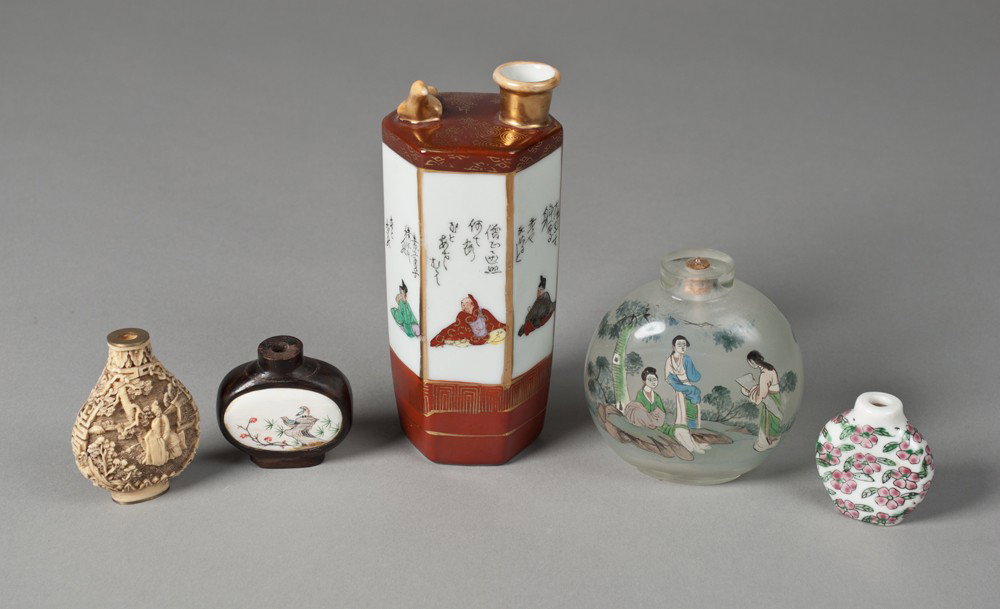 (5) Asian Porcelain, Glass & Cinnabar Items: Includes a Japanese Kutani pouring vessel, a reverse painted Chinese glass snuff bottle, a porcelain and enamel snuff bottle, a wood and ivory snuff bottle, and a cinnabar snuff bottle. Largest 6" H.