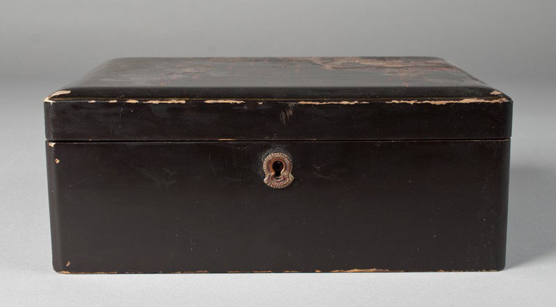 Japanese Lacquered Letter Box: Letter box with birds in a tree, painted in gilt, with a small section of the tree decorated in abalone. 3.75" H x 9.5" W x 7" D. Signed in LL on lid. Missing key and box does not connect where lock i