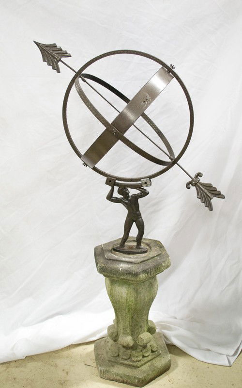 Architectural Stone and Metal Sun Dial: Stone column base with large metal sundial depicting a male figure holding up circular dials with arrow. 49.75" H, wear to stone base from elements.