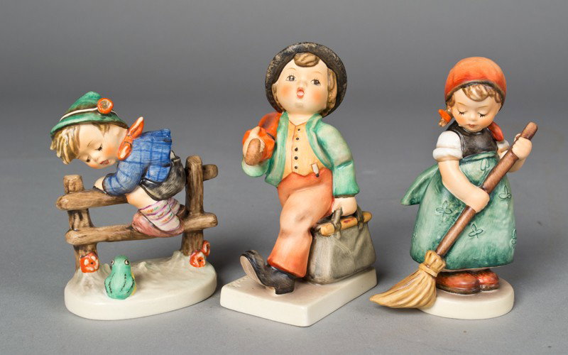 Grouping of (3) Hummel Figurines: Includes "Retreat to Safety," "Merry Wanderer," and "Little Sweeper." Tallest 4 & 7/8" H, all in excellent condition.