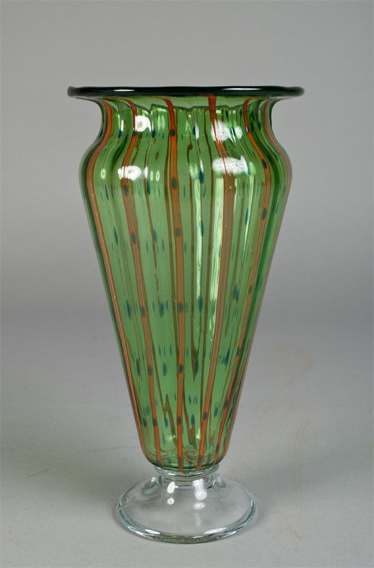A Fine Loetz Style Art Glass Vase: Footed vase in green with orange ribbons with additional green drips throughout and on clear glass foot. 12.25" H, excellent condition.