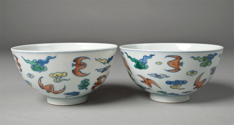 Pr. Of Chinese Famille Rose Dou Cai Bowls: Finely painted with bats and ruyi in multi-color. Six character mark within two concentric circles in underglaze blue on underside. 2.5 H x 4.75" Dia., circa 20th century.