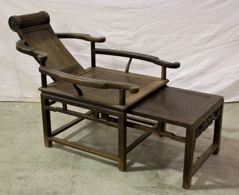 Chinese Qing Rosewood Opium Chair: Carved to depict Rayi scepter 60"L x 30"W x 34"H. Circa 19th Century.