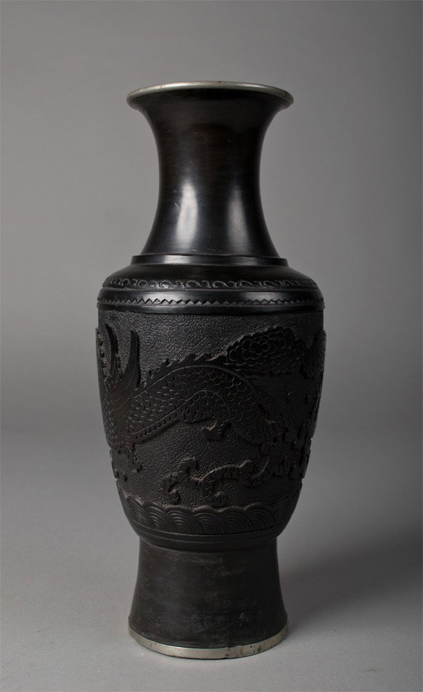 Chinese Cinnabar and Bronze Baluster Vase: Finely carved to depict dragons chasing a flaming pearl, 11" H, circa 20th century