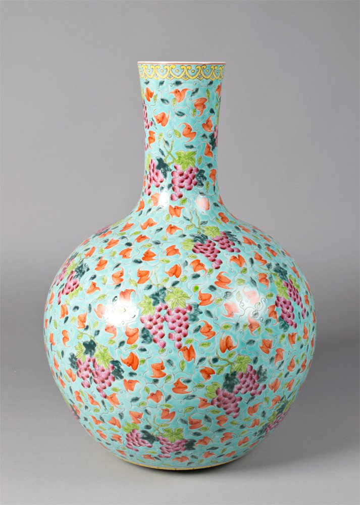 Chinese 100 Bats Porcelain Vase: Depicting one hundred bats and fruit against a turquoise ground. The base with blue underglaze with The Great Qing Qianlong Production. 22.5"H.