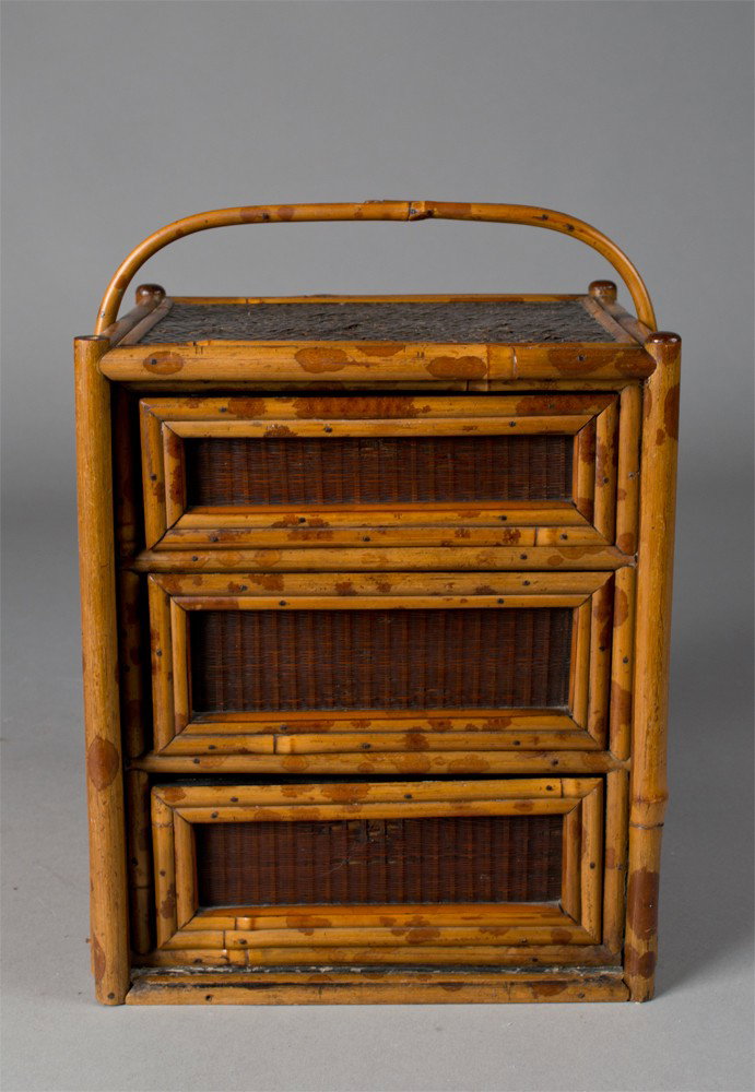 Japanese Three Drawer Miniature Cabinet: Finely constructed of bamboo and bamboo veneer the top and sides inset with rattan, 11"H X 8.5XW 6.5"D early 19th century.