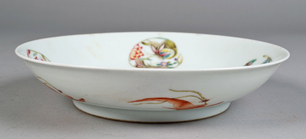 Chinese Famille Rose Porcelain Bowl: The interior finely enameled with five roundels depicting butterflies and foliage the exterior rim finely painted to depict bats carrying cherry blossoms, the recessed base with six character mark in 