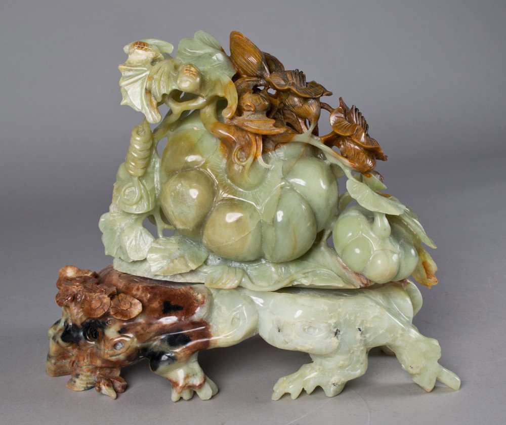 Chinese Jade Carving of Pumpkins and Bats: Finely carved to depict pumpkins on vines with pumpkin flowers and two small bats, 7'5"H X 9"75"W circa 20th century.