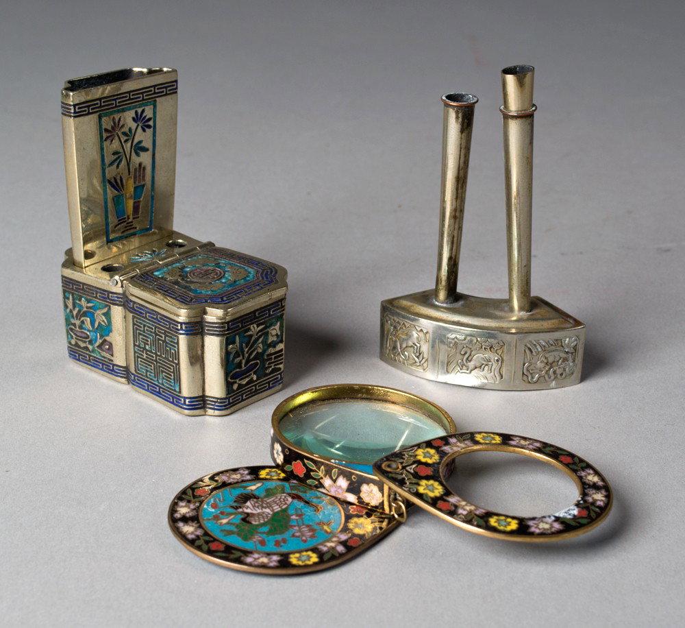 (3) Pieces Chinese Silver and Enamel Objects: To include a lidded box probably an ink stand, a magnifying glass and possibly a pen holder two with raised decoration one with eight character incised under lid tallest is 4"H circa 20th century.