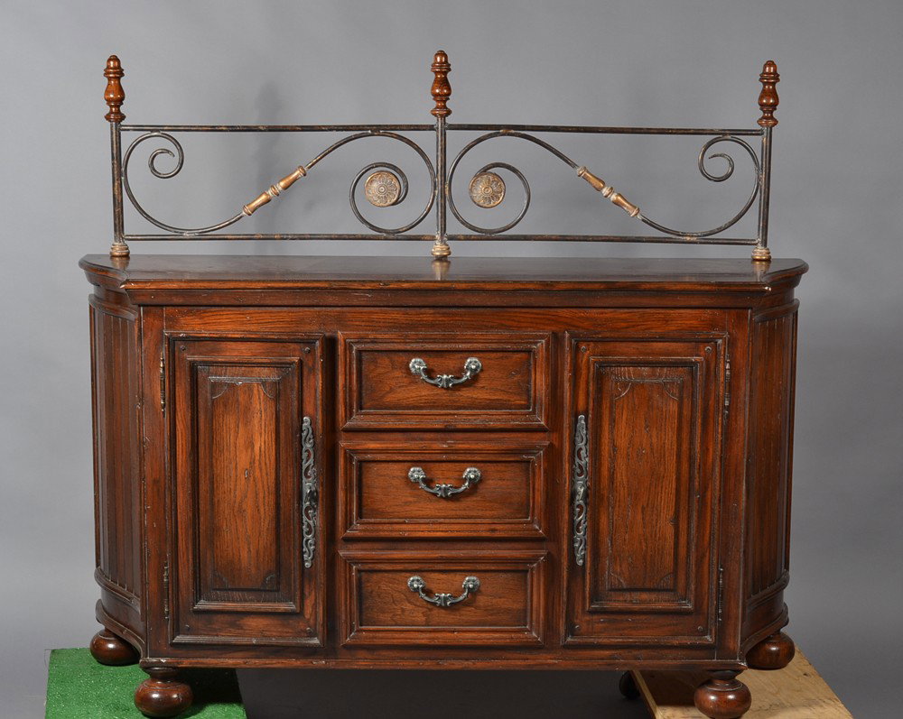 Wood Sideboard with Iron Rack: Probably pine, sideboard with two recessed panel side cupboards opening to reveal single shelf, with three dovetailed drawers with recessed panels, and waynescoat style sides, resting on four bun feet