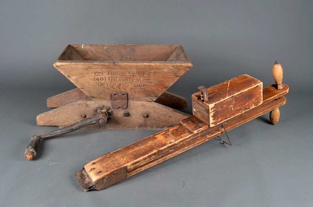 Antique Corn Crusher and Grape Crusher: Includes a hand crank wood and iron corn/grain crusher, together with a wood and iron grape crusher. Longest 35" L. Circa