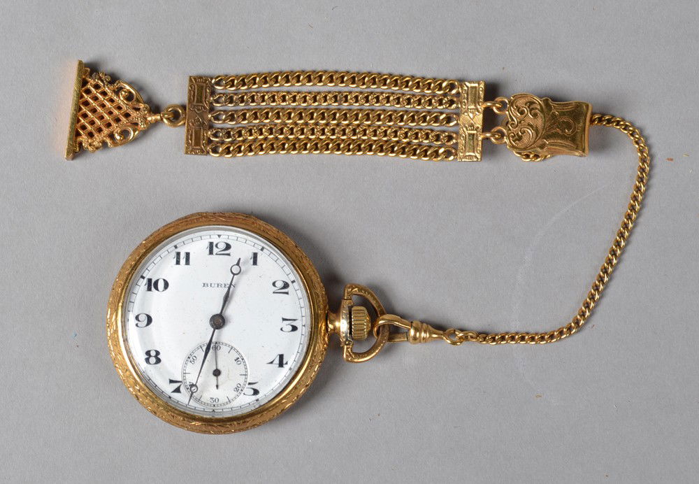 Antique Buren Pocket Watch: 16 jewels, 2 adjustments, attached to fob, marked 9046032 and Supreme I.W.C. Co., on inside of cap. 2.25" L, in working condition. Circa late 19th/early 20th century.