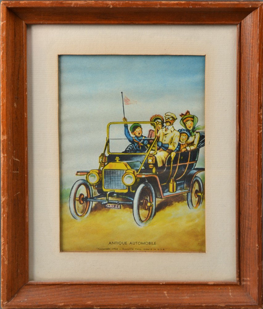 1950's "Antique Automobile" Motion Lamp: Image depicting figures in an antique car, titled below, copyright 1953, and in frame form with motion in reverse. 10.25" H x 8" W x 5.25" D.