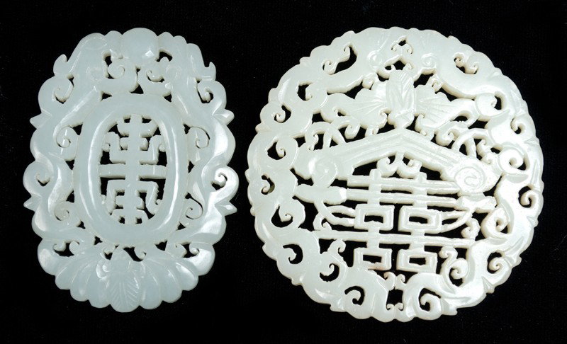 (2) Chinese Carved Jade Plaques: Both finely carved with one depicting "Long Living," and other "Double Happiness." Largest 2.75" Dia., circa 20th century.