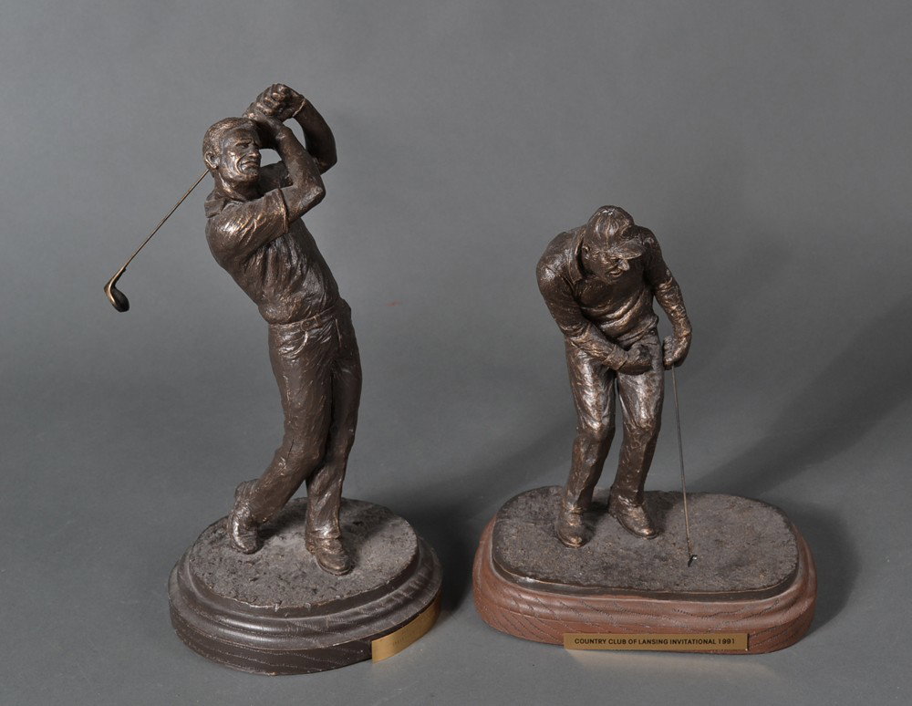 (2) Bronzed Golf Statues: Both with nameplates, one titled "Country Club of Lansing Invitational 1991," other titled "Blythefield C.C. Invitational Champions 1991." Tallest 13.5" H. Circa late 20th century.