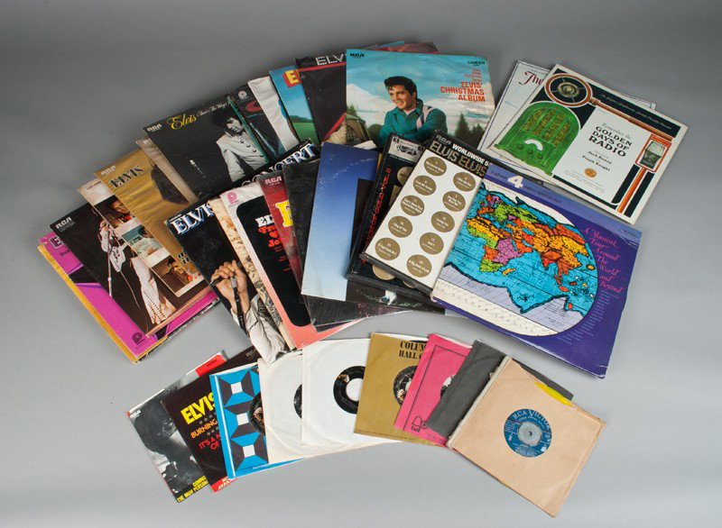 Grouping of (39) Elvis & Other LP's & 45's: Twenty-six Elvis Lp's to include "Almost in Love," "Moody Blue," "Aloha from Hawaii via Satellite," and eight 45's to include "Patch it Up and You Don't have to Say You Love Me," "Burning Love and It'