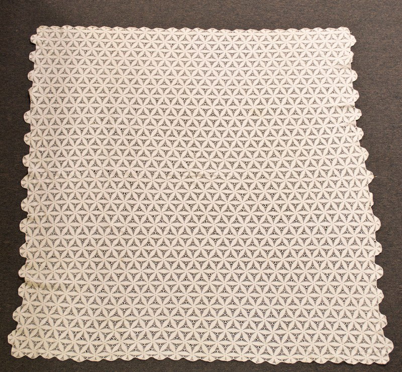 A Fine Antique American Crocheted Coverlet: Appears to be used as a bedspread or table cover, finely crocheted six leaf clovers with scalloped edges, 81" x 74", some surface grime. Circa early 20th century. Private collection Columbiaville, MI.