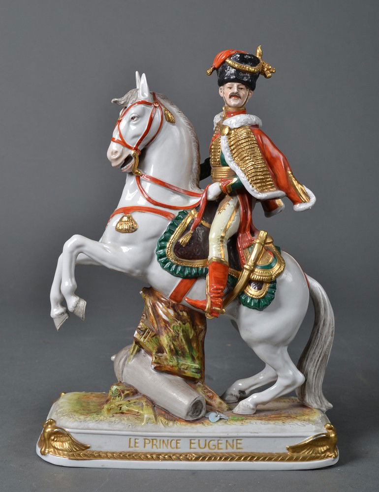 Schumann Dresden Porcelain, Napoleonic Soldier: "Le Prince Eugene," depicting calvary soldier on horse, hand painted, and with name fired in gold on base. Marked for Schumann and Germany in blue on underside. 11" H x 7.75" L x 3.5" W. Circa late 19