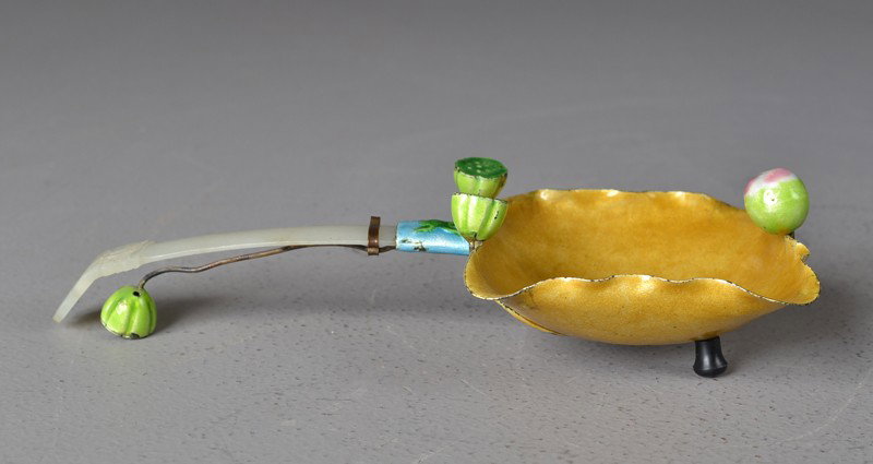 Chinese Qing Jade Handled Enamel Dish: Depicting enameled green lotus pods on edge of incised leaf and under handle, also having bats on the handle, circa 19th C., 8.5"L.