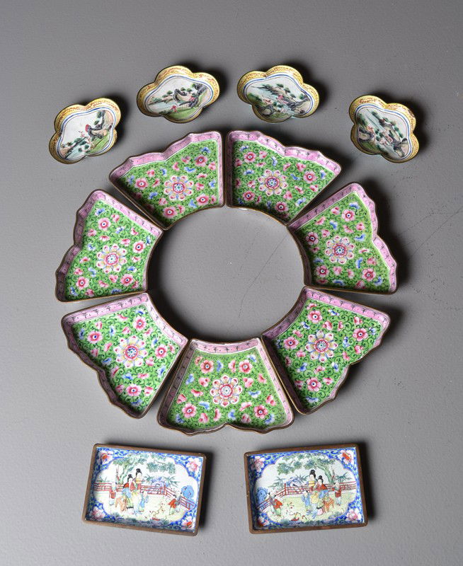 Set of (13) Chinese Qing Canton Enamel Dishes: Several enamel dishes: seven green/pink (3.5" x 5", 13" diameter, assembled) sectional pieces fitting into floral shape, along with two rectangular dishes (4.25"L)having figures on veranda, and four y
