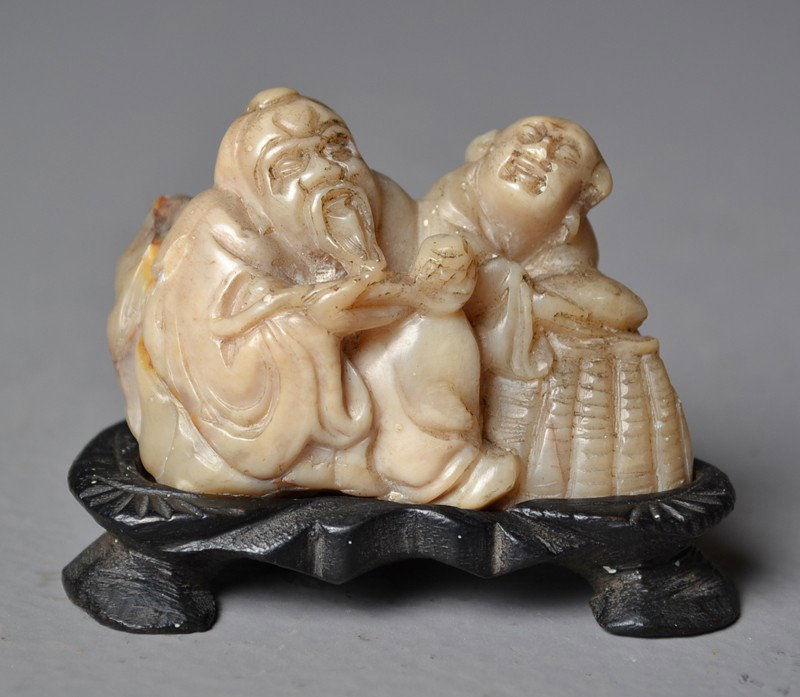 Chinese Qing Carved Soapstone Figure Group: Finely carved to depict an old man and a boy,very well done, Circa 19th century, 2"L X 1.5"H without stand.