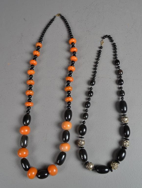 (2)Chinese Qing Horn Necklaces: Finely carved, one necklace to include silver metal balls, longest is 39"L,circa late 19th/early 20th century. Private collection Oxford MI.