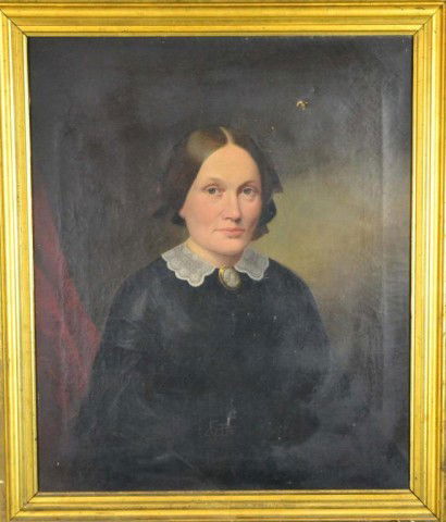 American School Oil Painting On Canvas: Depicting a seated lady with black robe, in the style or school of Ammi Phillips, Apparently unsigned but very well done, 29.25" H x 24.5" W sight, 34" H x 29.25" W framed. Circa 1830. Mounted in its