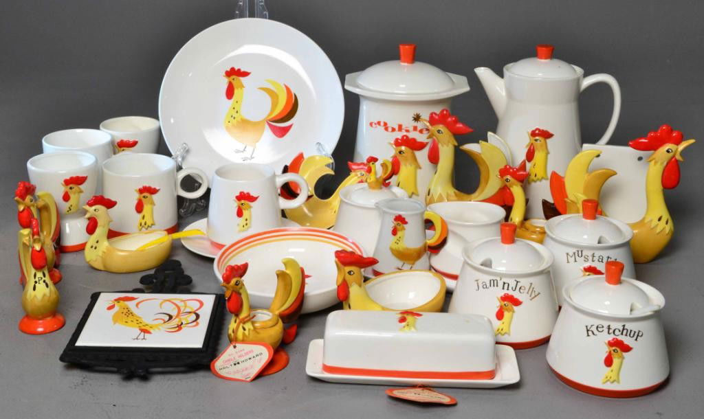 (31) PC. HOLT HOWARD 'ROOSTER' TABLE ITEMS: To include: 2 egg cups, 3 mugs, trivet, butter dish, cream, sugar, mustard container, jelly container, spoon rest, salt and pepper, 2 candleholders, napkin holder, dish, plate, cookie jar, coffee pot