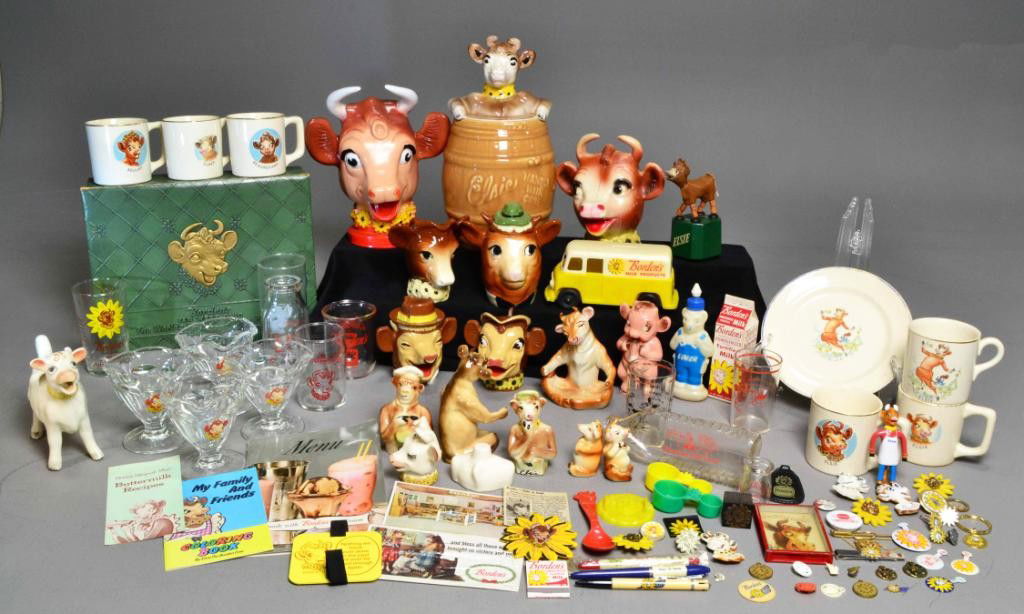 (152) PC. 'ELSIE THE COW' COLLECTORS LOT ca. 1950's: Variety of items depicting the Elsie the Cow image, cookie jar, bank, creamer and sugar sets, glass bottles, toy delivery truck, vintage sundae dishes, gilt rimmed mugs, plate, circa 1950's. Private c