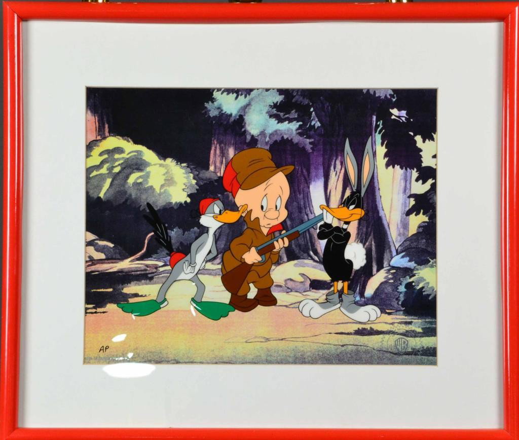 LIMITED EDITION WARNER CELL - RABBIT FIRE: Colorful framed Warner Brothers Sericel, dated 1978 WB-18 on reverse, from 1951 original of Elmer Fudd trying to decide whether to shoot Daffy Duck dressed as a rabbit or Bugs Bunny disguised as a duc
