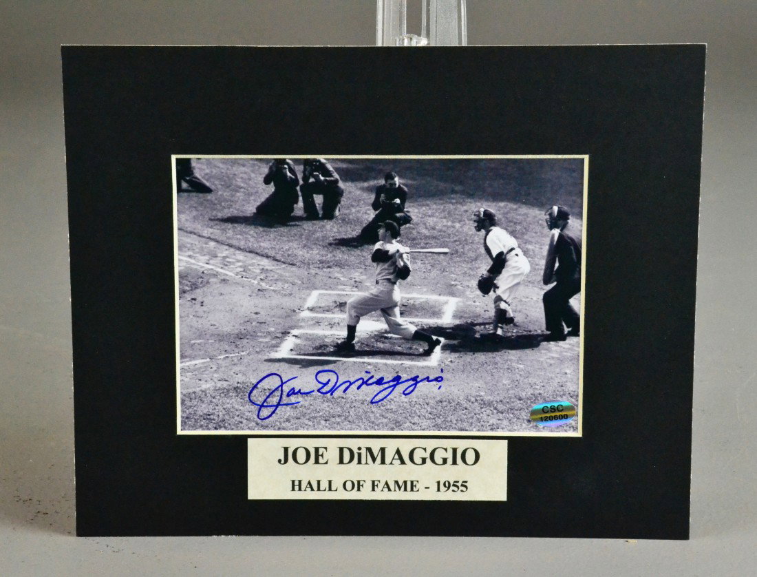 JOE DiMAGGIO AUTOGRAPHED PHOTO - BATTING: Autographed black and white photo of Joe DiMaggio, Hall of Fame - 1955, batting at the plate, 6.5" x 4.4", matted in black. Private collection Margate, FL.