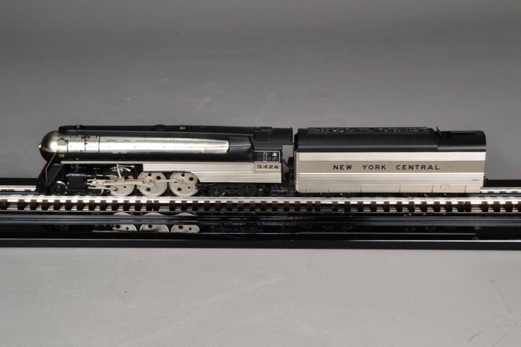 (2) SUNSET MODELS - LOCOMOTIVE & COALCAR: Including stunning 3-rail locomotive, NYC J-3 Hudson, Empire State Express, #5426, painted silver with black lettering "New York Central," measuring 15" L, coal car similar color, 10.5" L, new in box.